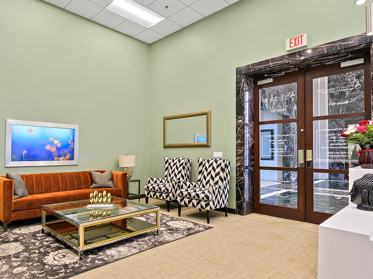 A nurse speaking with a patient after treatment